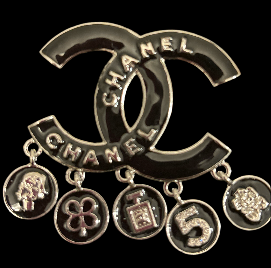 Silver charm Brooch